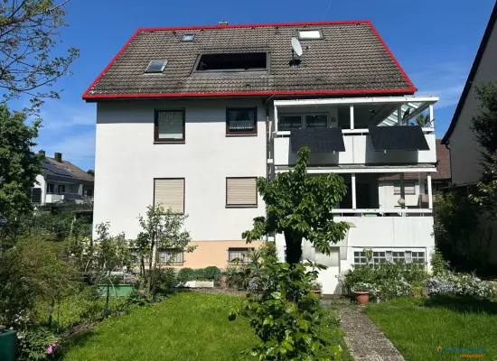 Hinteransichtder Immobilien: Dachgeschosswohnung mit Sonnenterrasse und Stellplatz! (Foto)