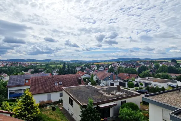 Aussicht der Immobilie: Dachterrasse zum Verlieben - Familienglück mit Garten (Titelbild)